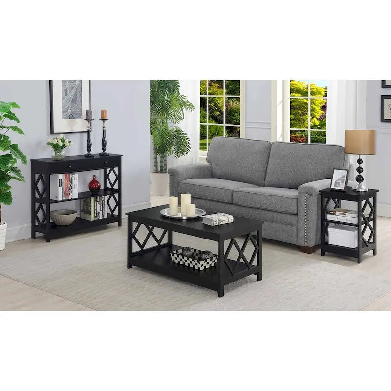 Table basse à deux niveaux avec découpes en losange, coloris noir/blanc/gris et étagère inférieure