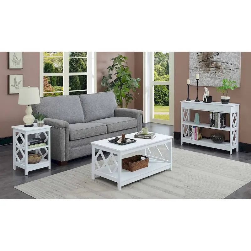 Table basse à deux niveaux avec découpes en losange, coloris noir/blanc/gris et étagère inférieure