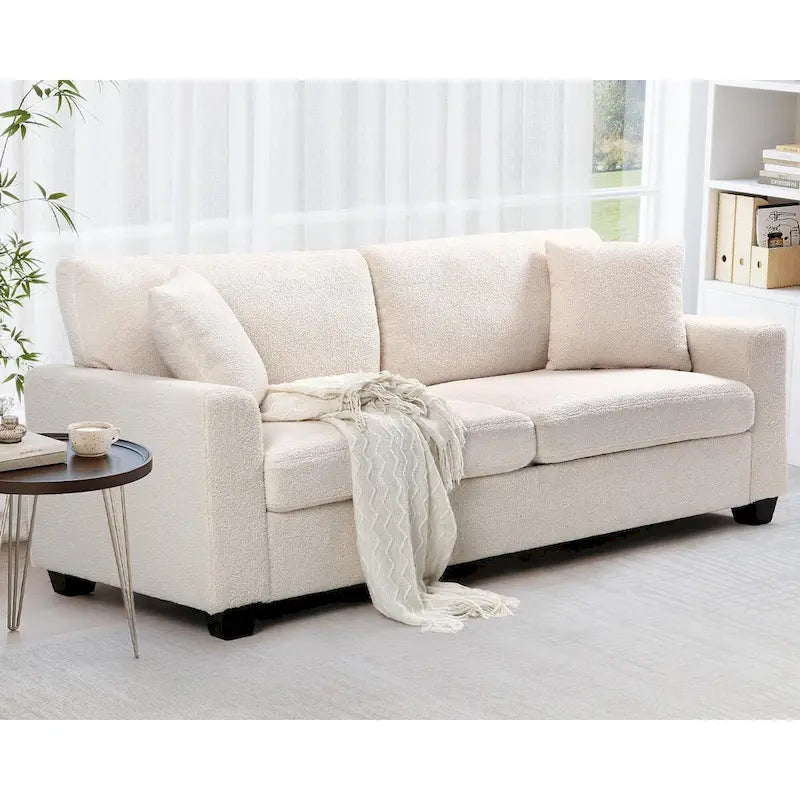 Canapé 3 places en tissu bouclé beige